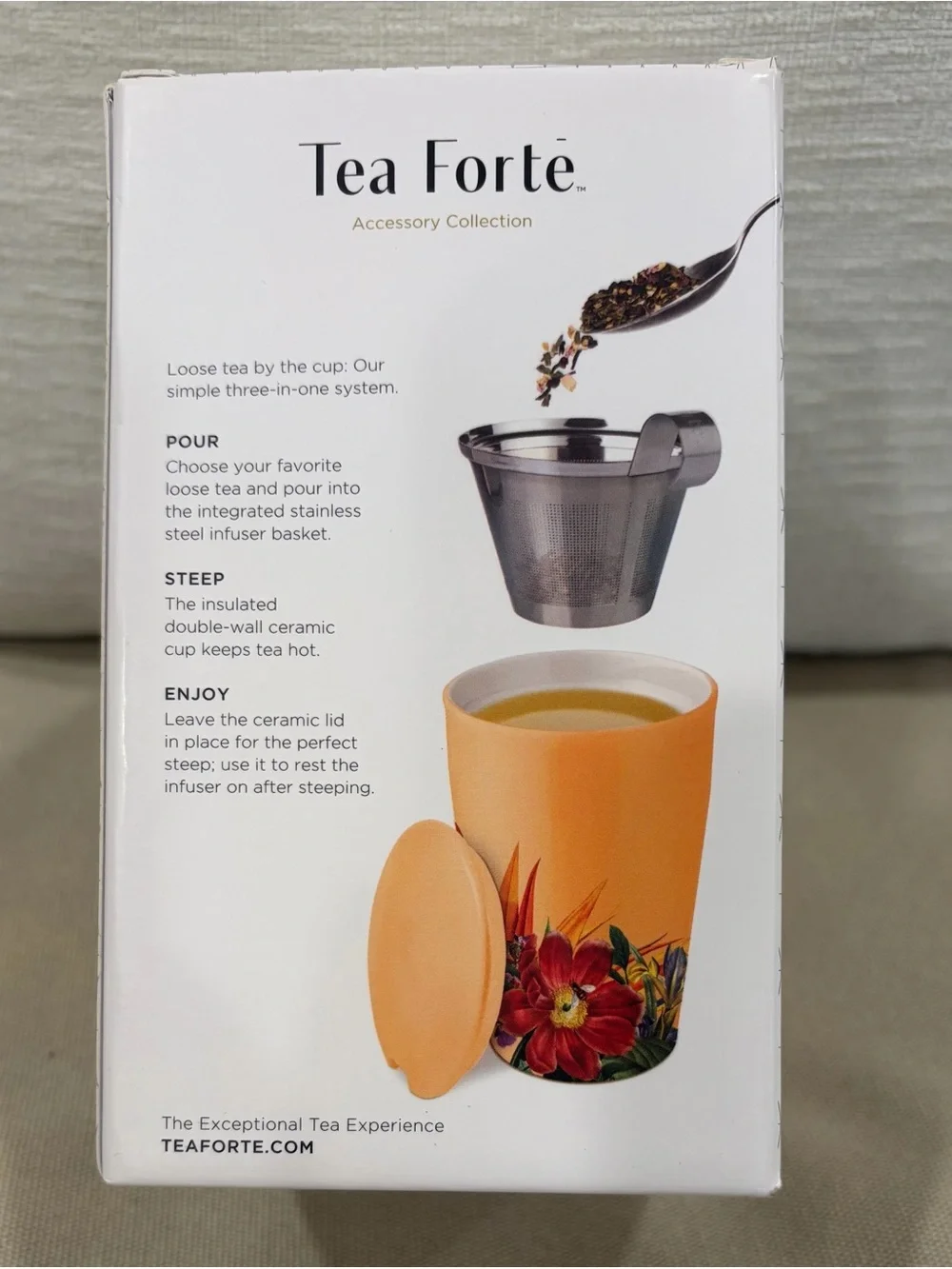 Forte Orange Ceramic Steeping Cup with Floral Accent